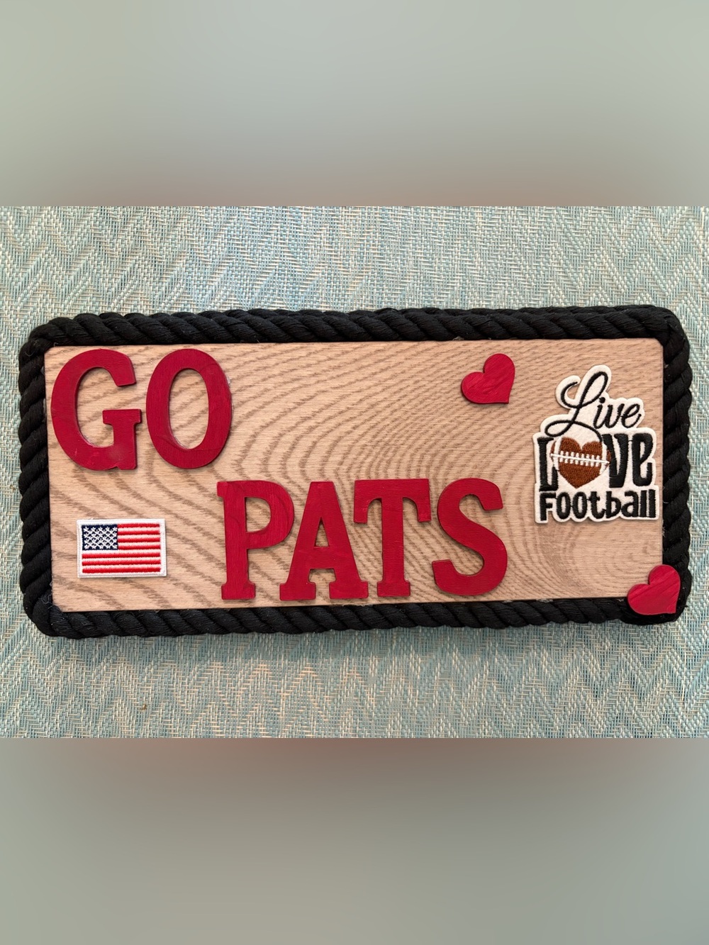 Red and black  'Go PATS' Decorative sign